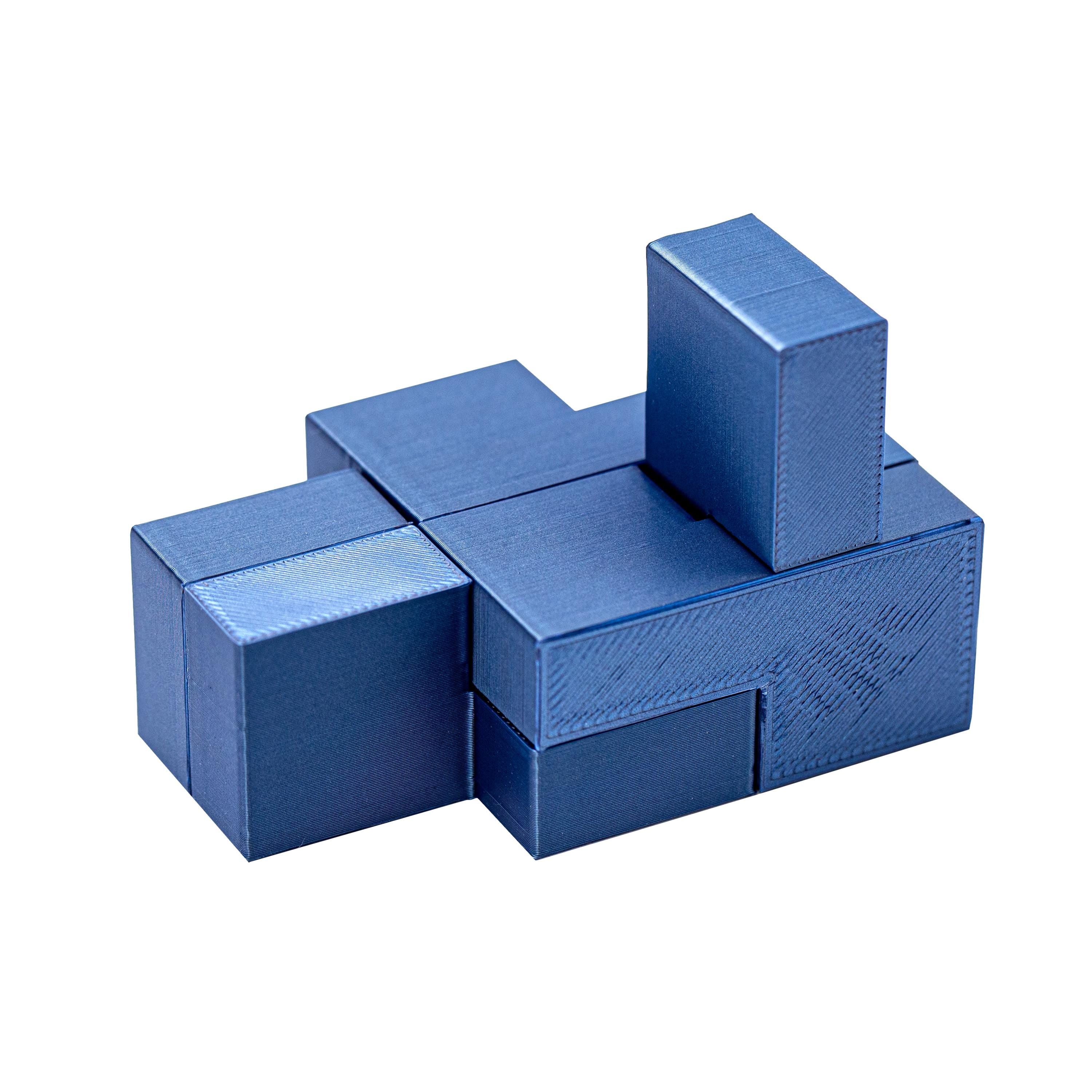 Five Cubes puzzle. Make 5 cubes using 5 parts.