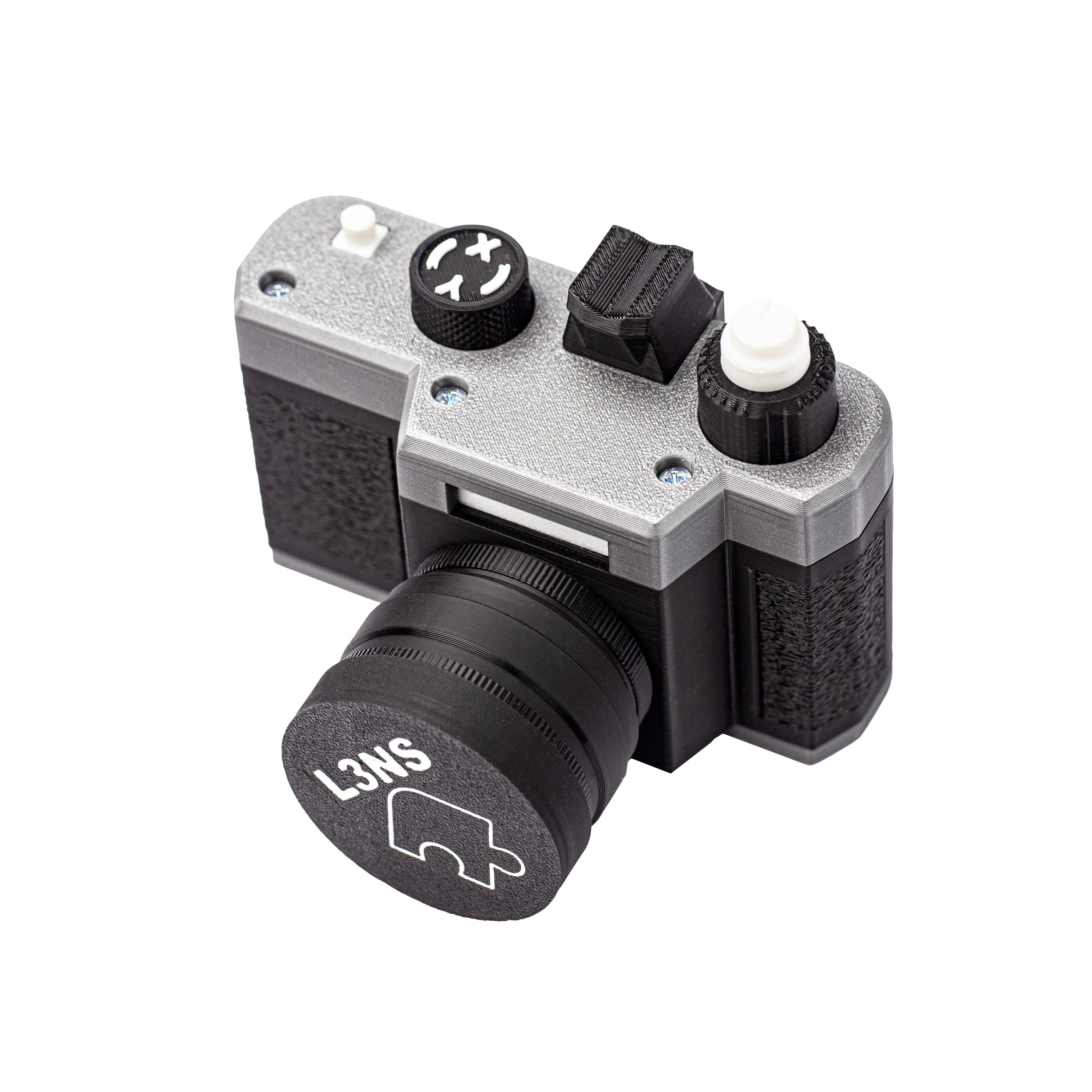 🧩 L3NS — Camera-Shaped Sequential Discovery Puzzle