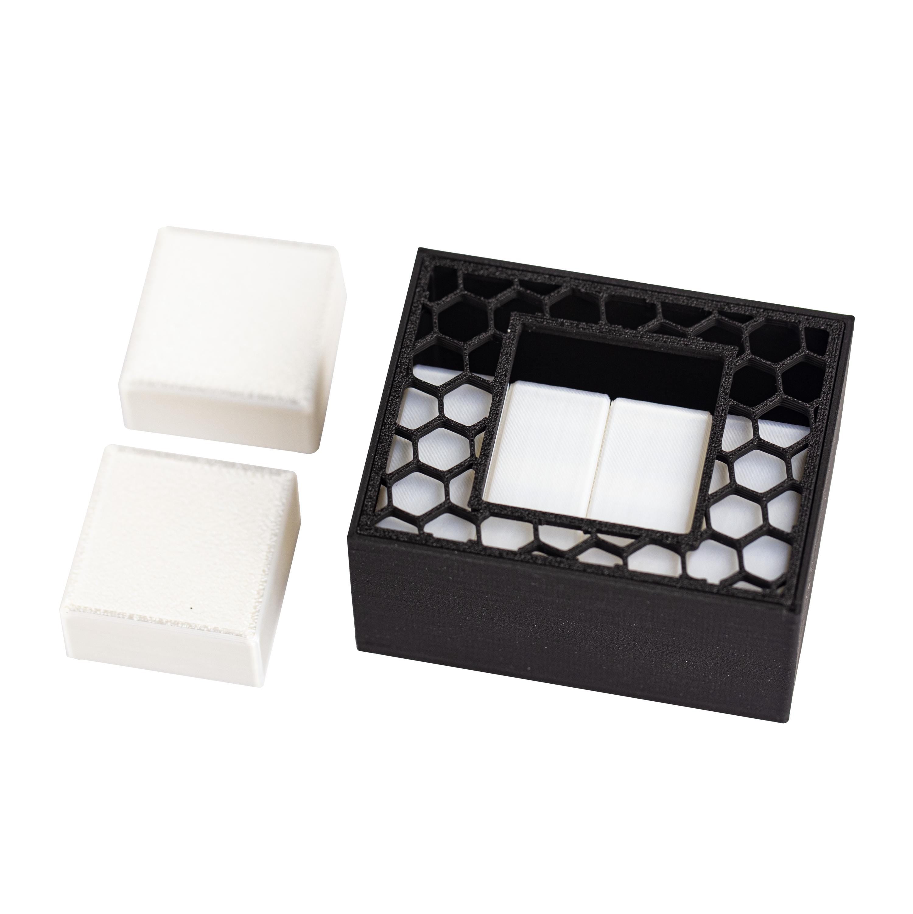 Quadro puzzle. Can you pack all 6 parts inside the box?