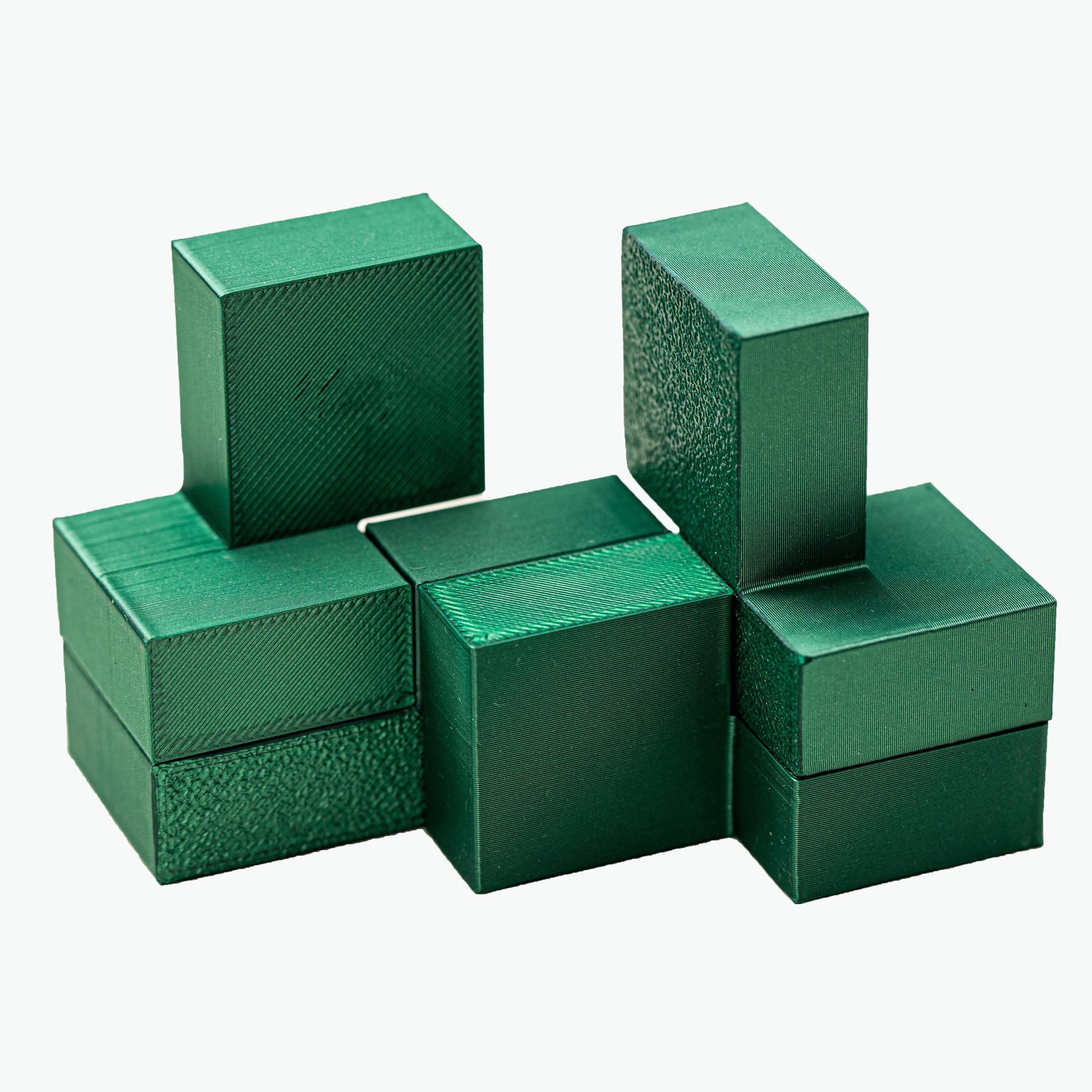 Four Cubes puzzle. Make 4 cubes using 4 parts.
