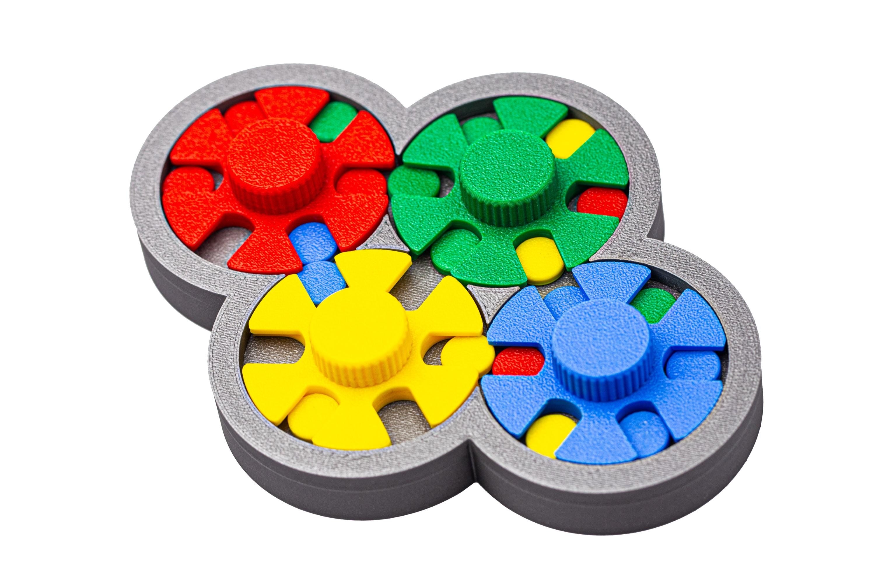 Match the colors of disks and spinners. Serendipitous Diskovery puzzle.