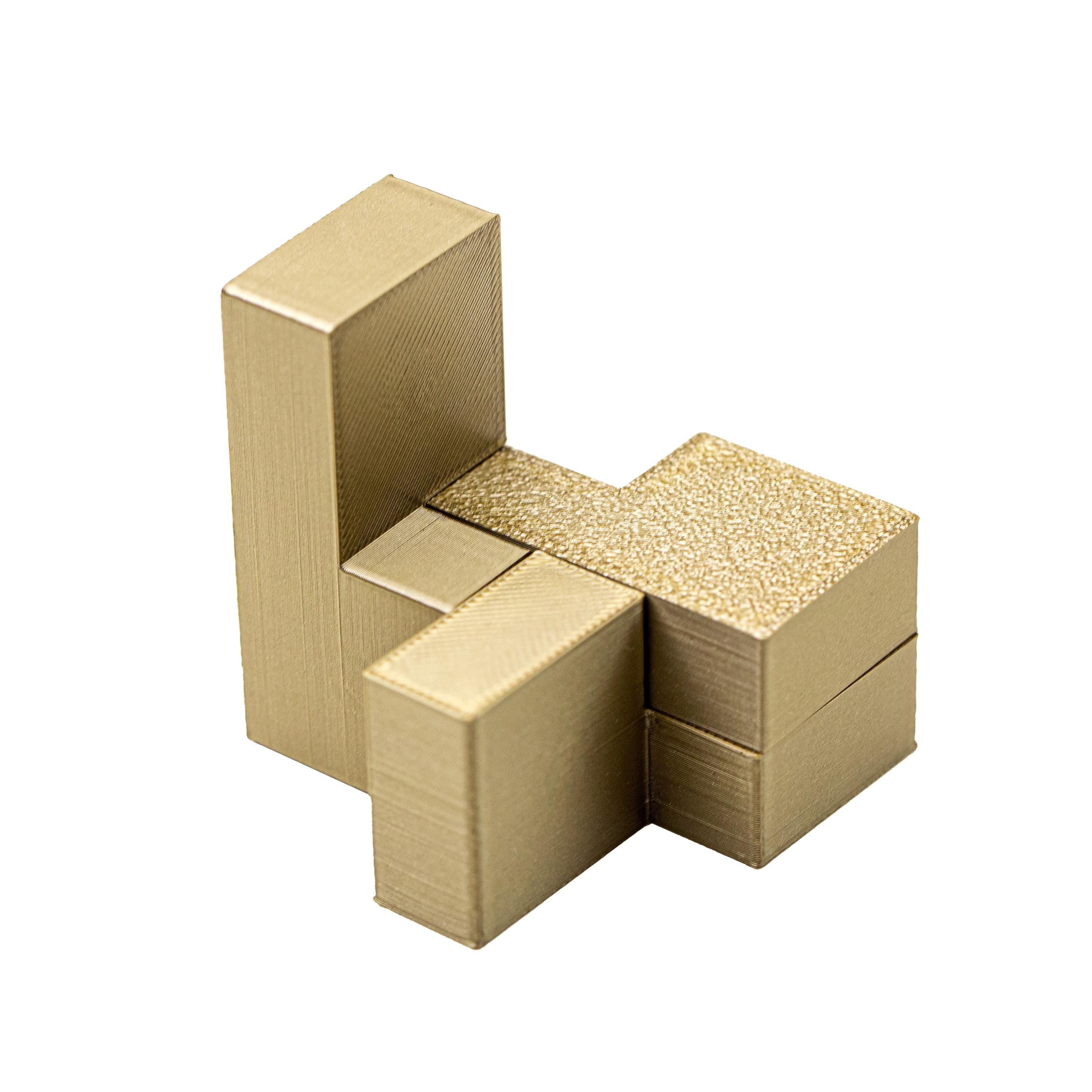 Three Cubes puzzle. Make 3 cubes using 3 identical parts.