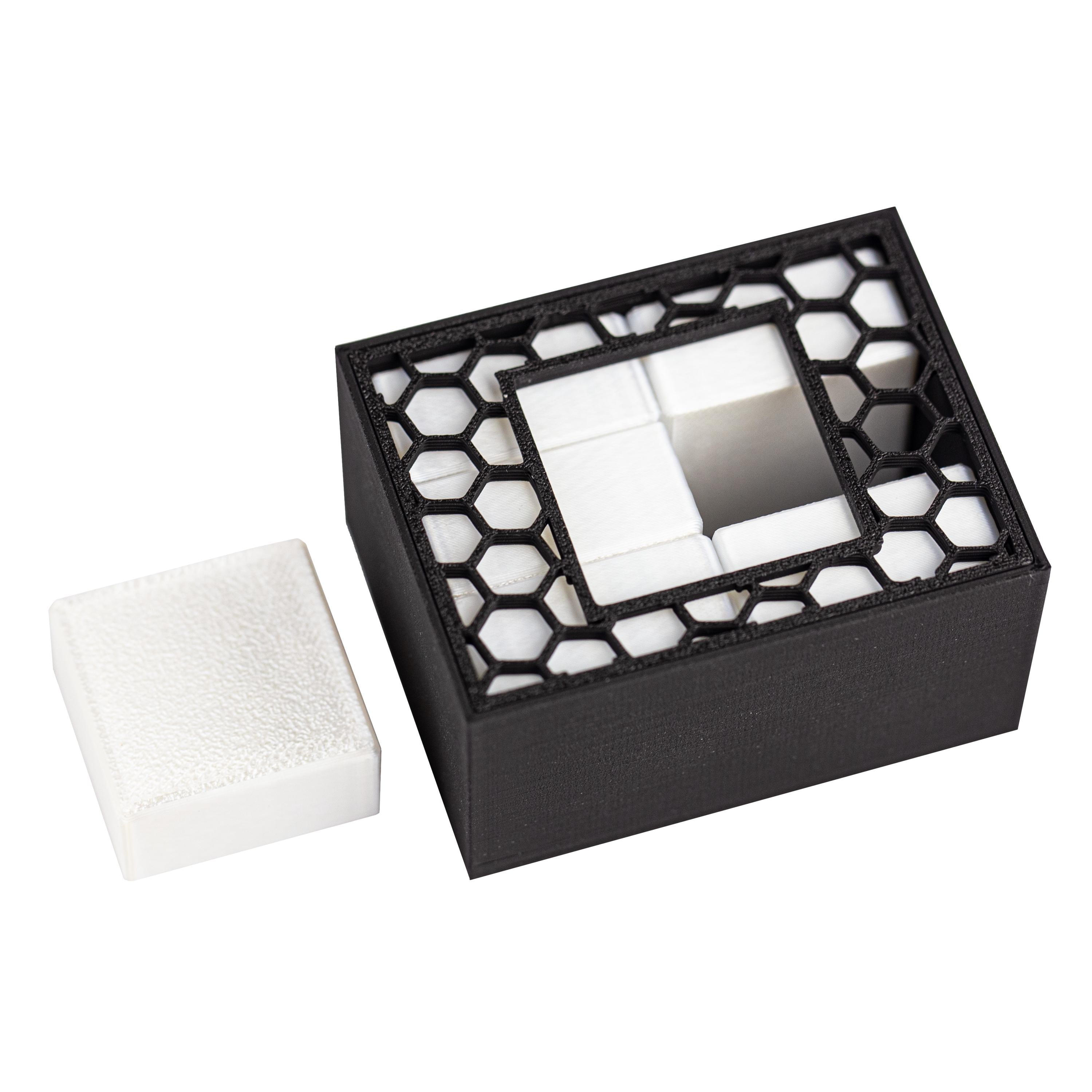 Quadro puzzle. Can you pack all 6 parts inside the box?