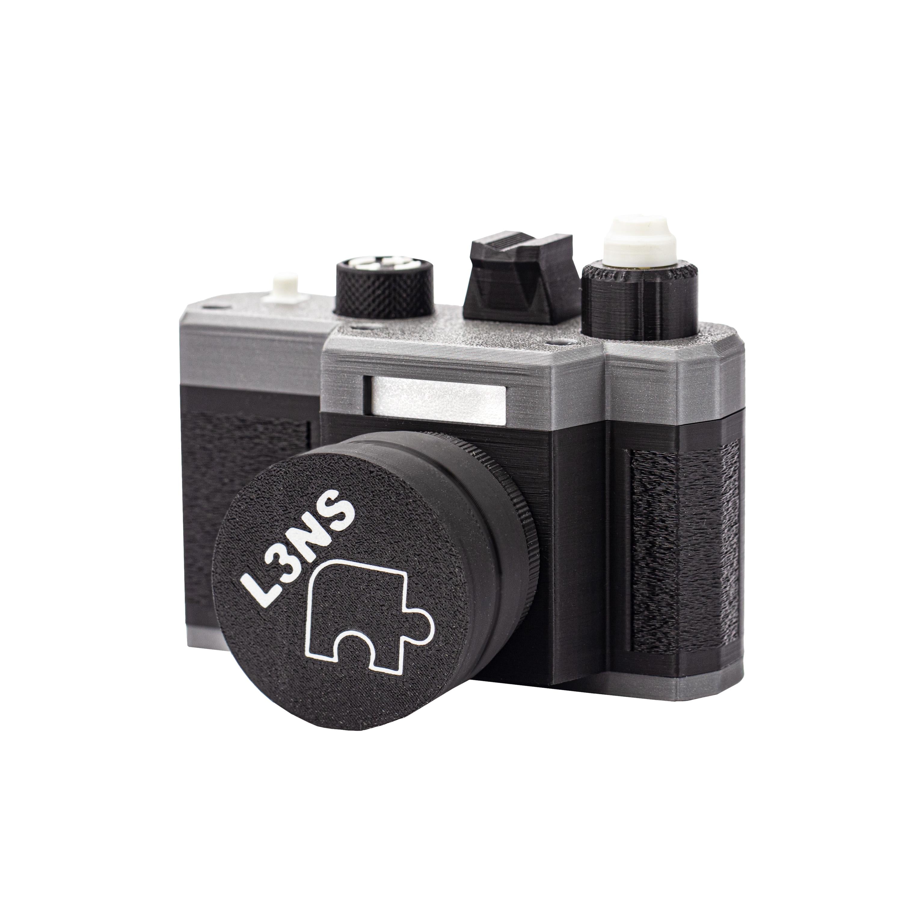 🧩 L3NS — Camera-Shaped Sequential Discovery Puzzle