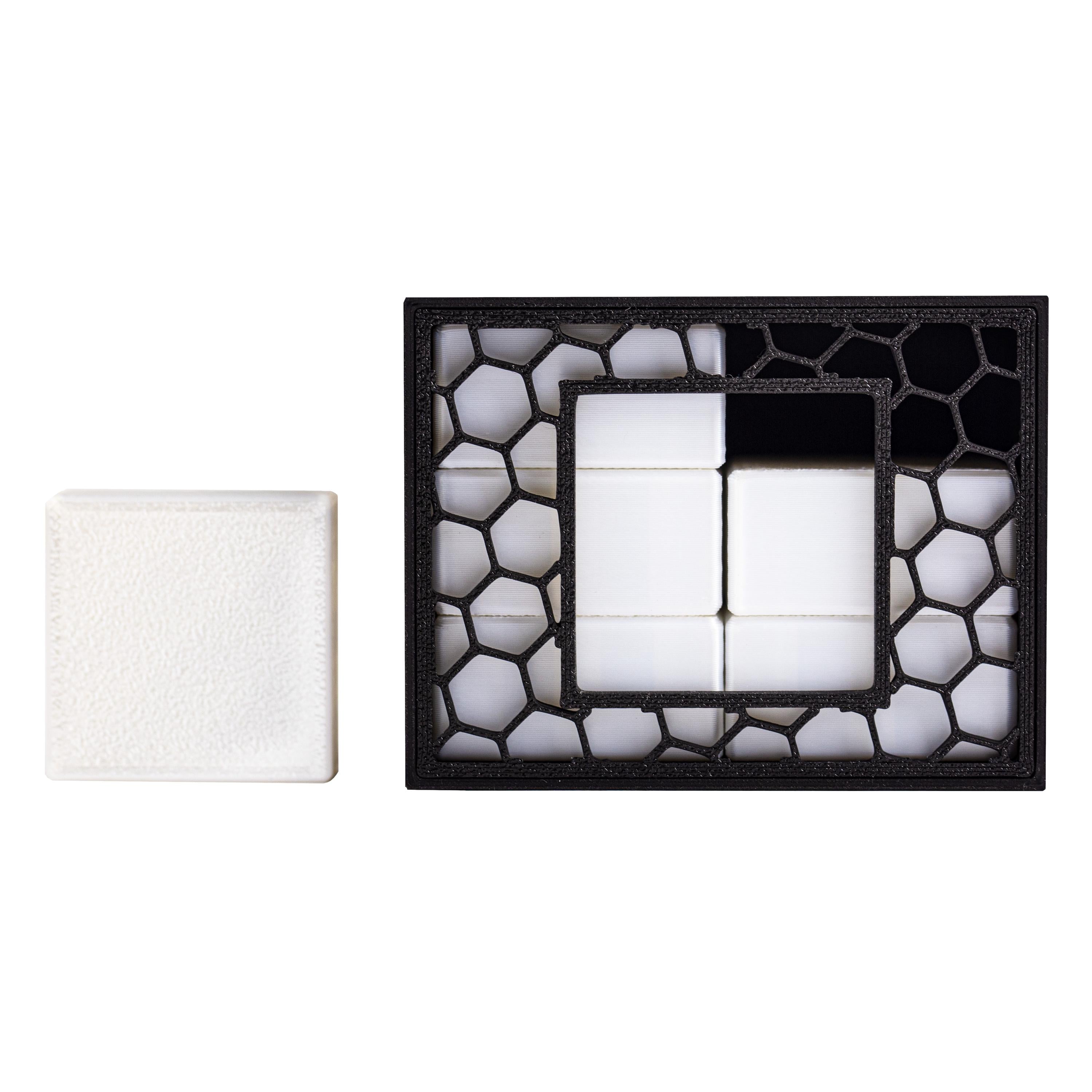 Quadro puzzle. Can you pack all 6 parts inside the box?
