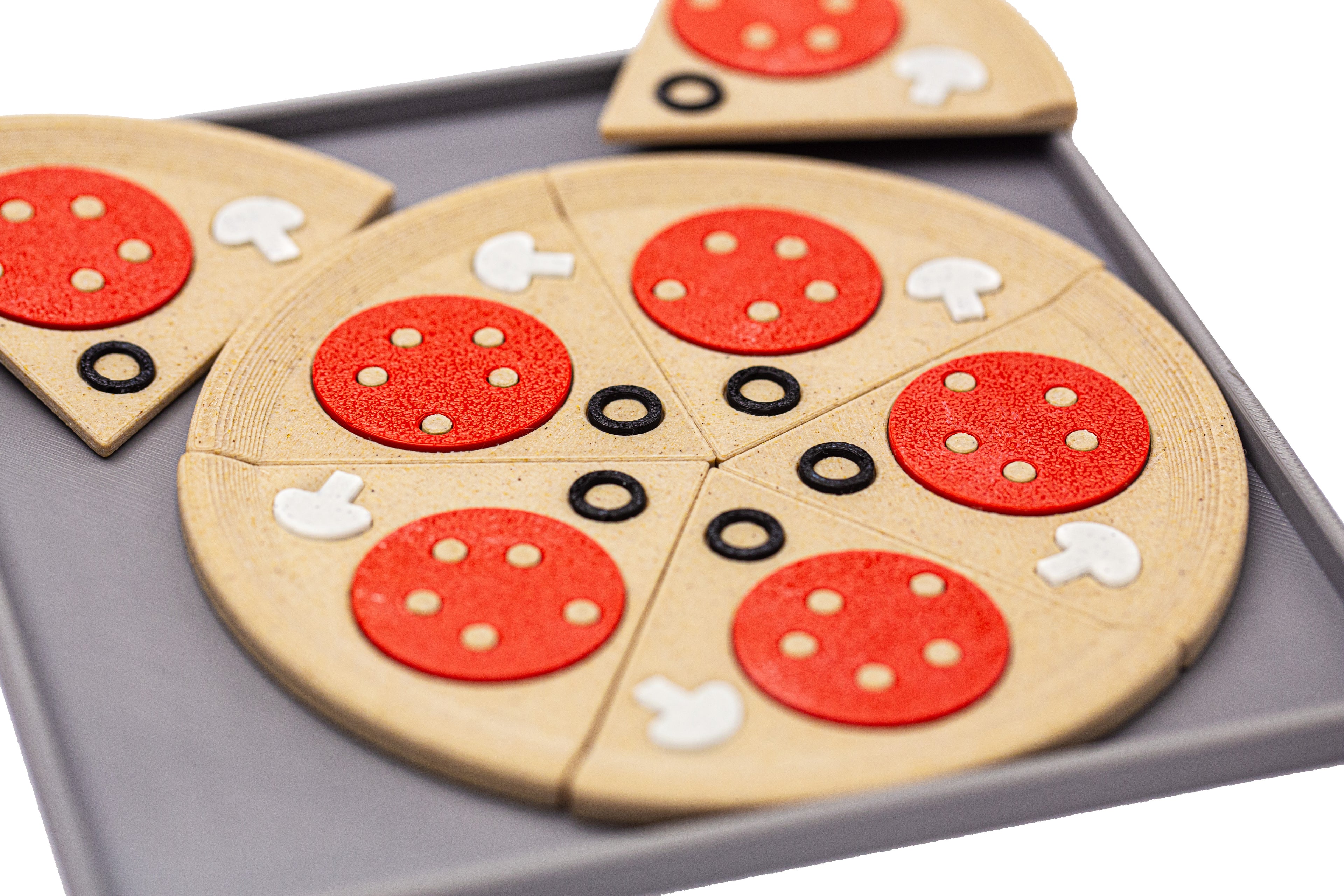 Pizza penne puzzle. Fit 7 pizza slices into the frame.