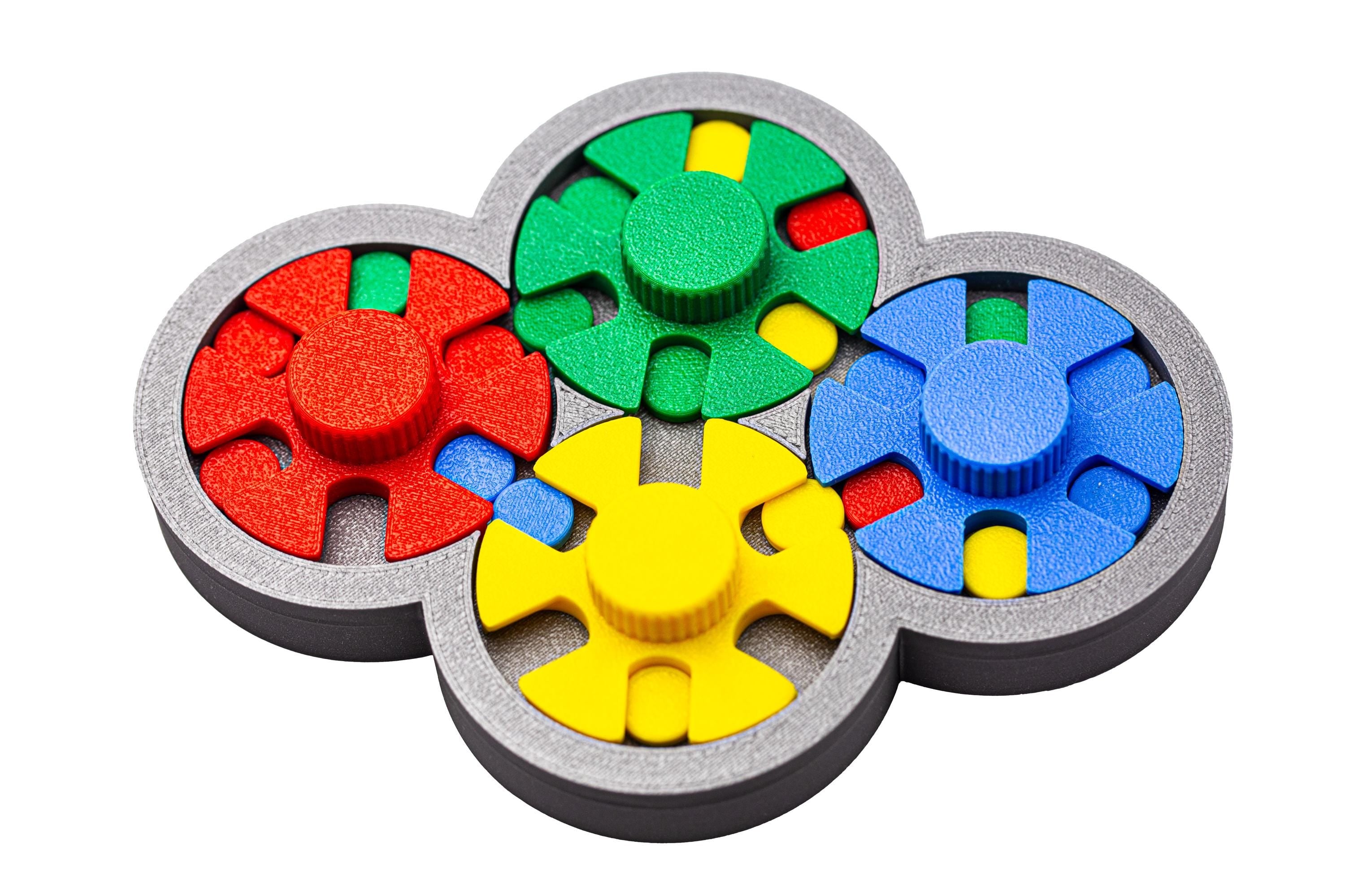 Match the colors of disks and spinners. Serendipitous Diskovery puzzle.
