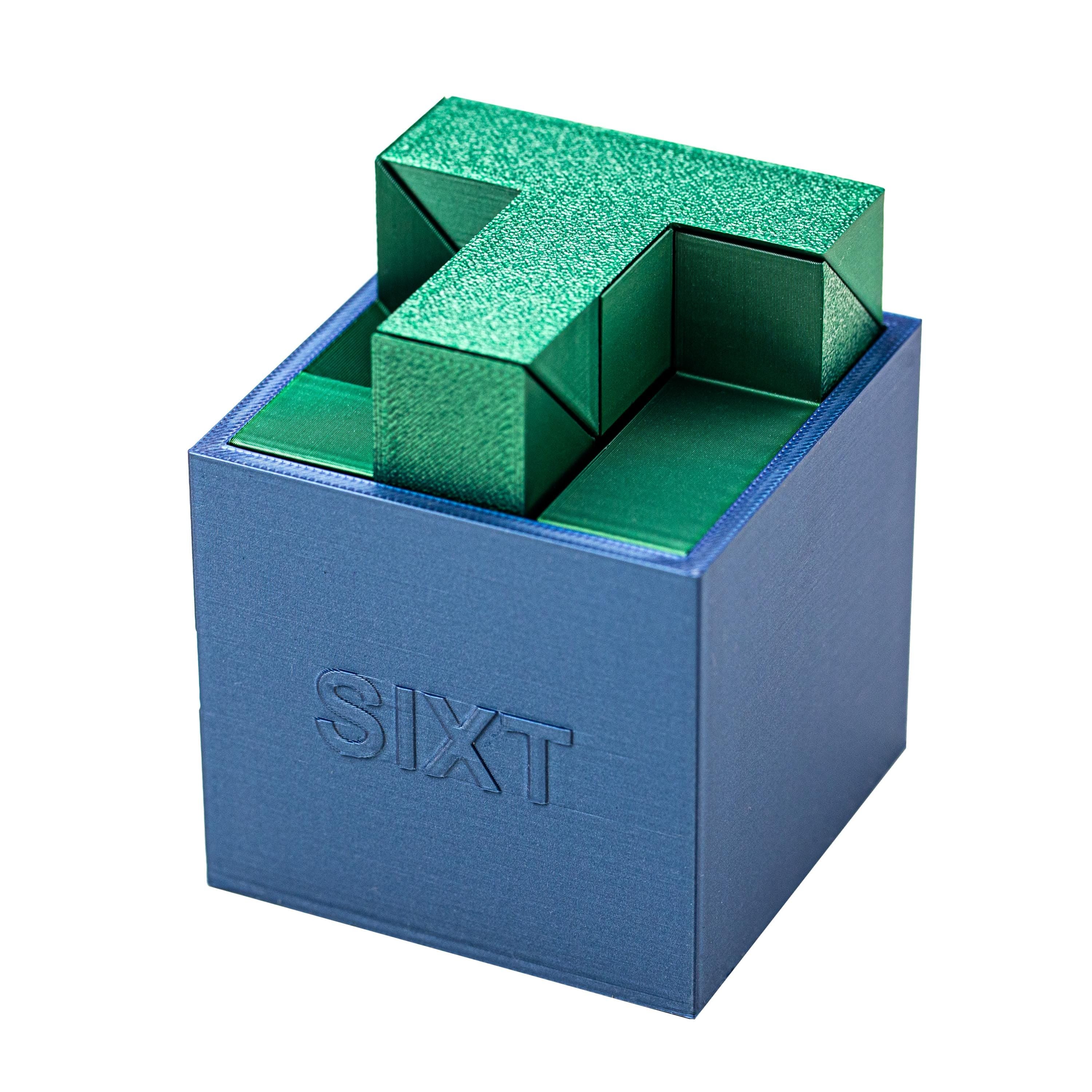 SIXT puzzle. Put all 6 parts inside the box.