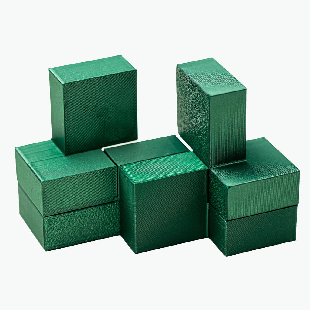Four Cubes puzzle. Make 4 cubes using 4 parts.