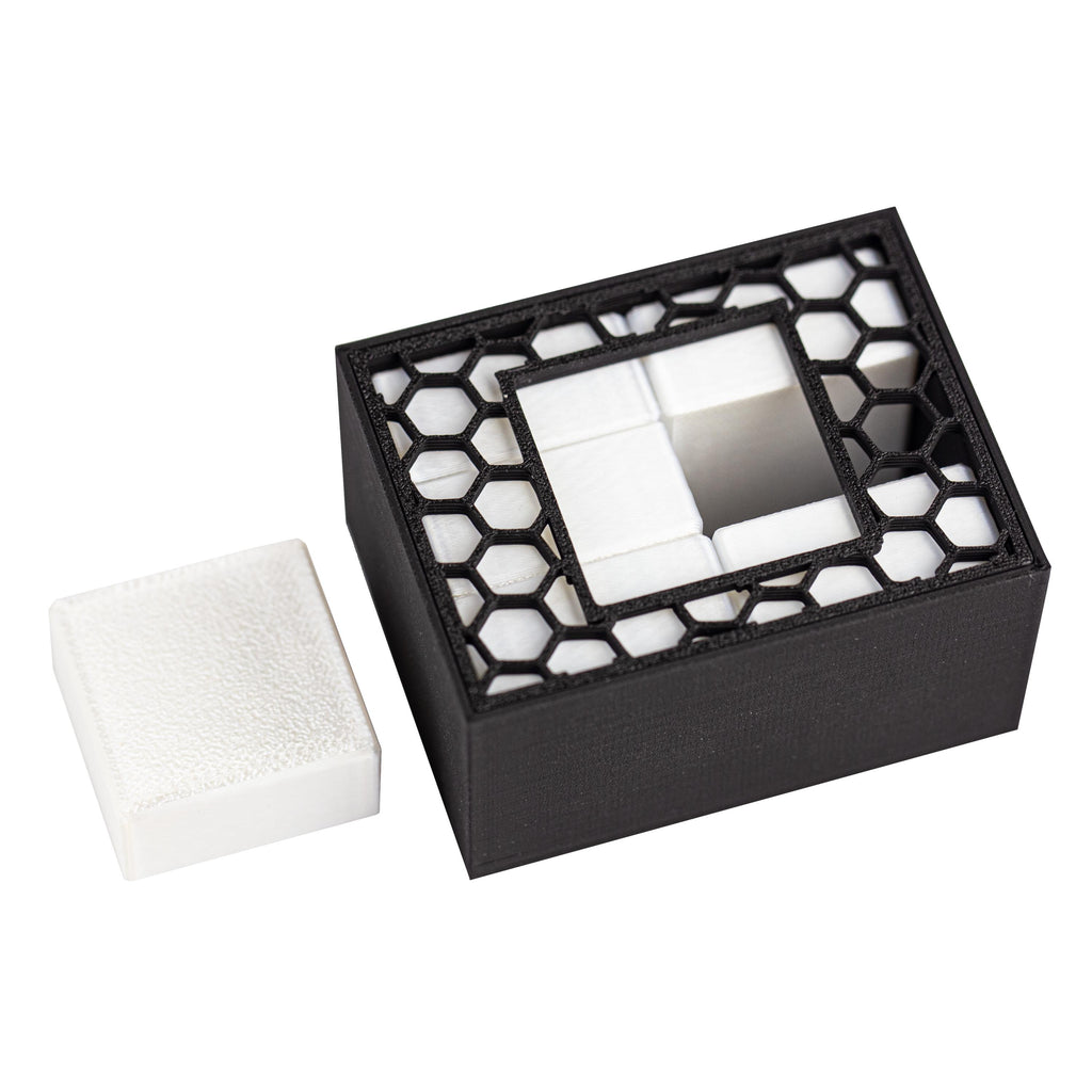 Quadro puzzle. Can you pack all 6 parts inside the box?