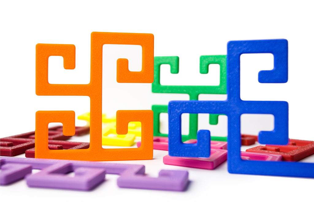 Tetra Spirals - 2D assembly puzzle.