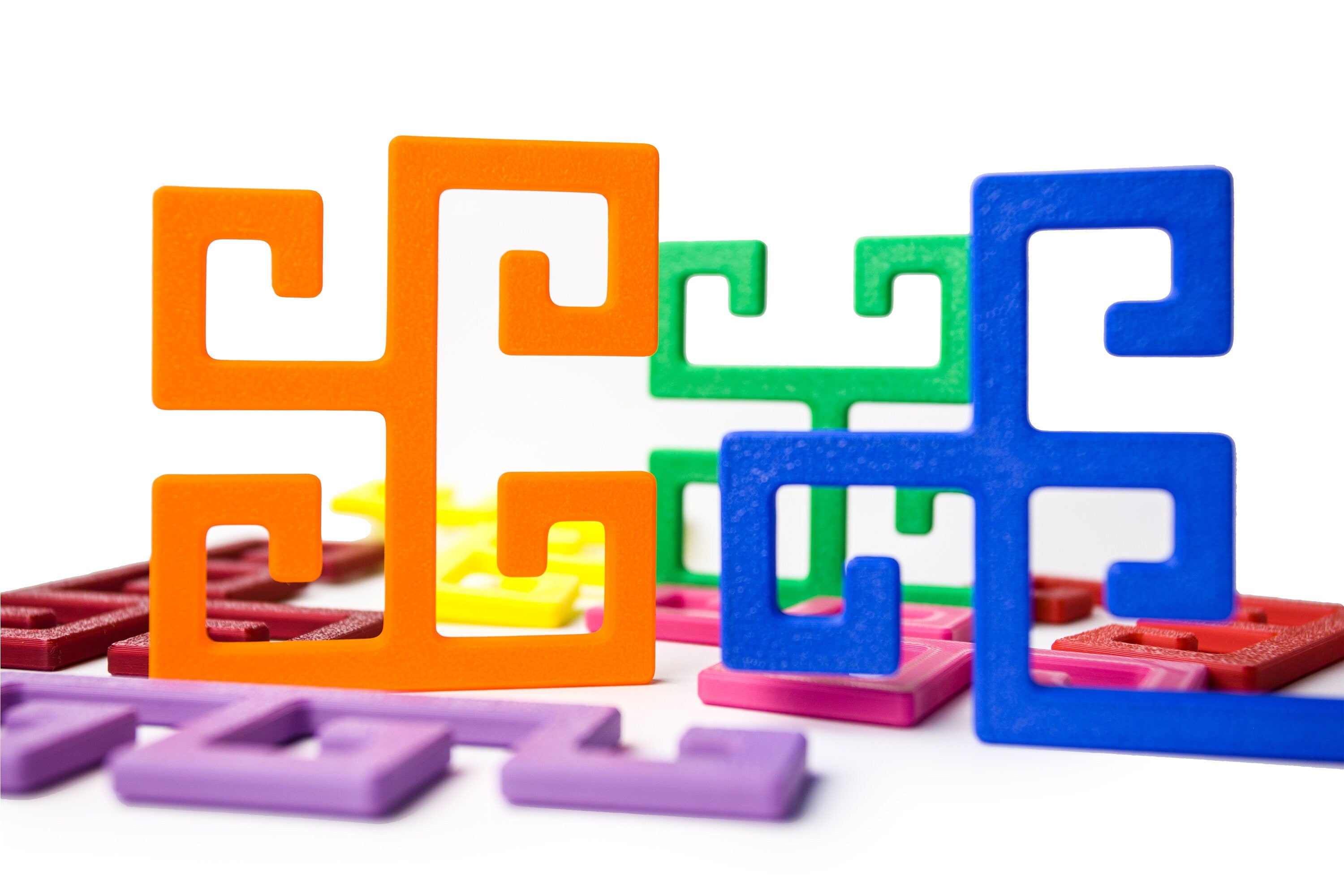 Tetra Spirals - 2D assembly puzzle.