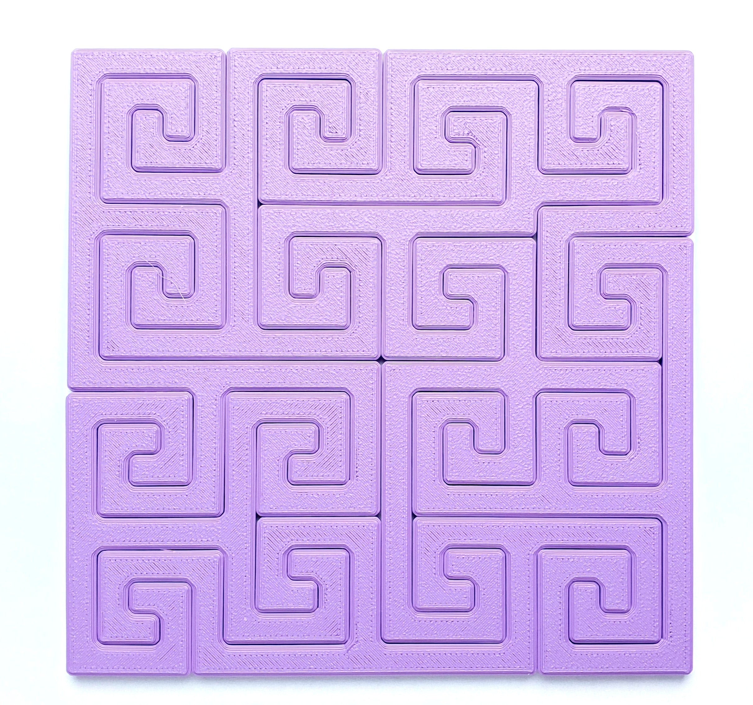 Tetra Spirals - 2D assembly puzzle.