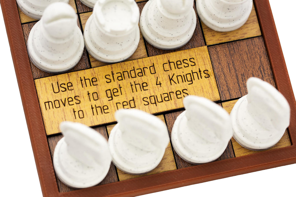 Four Caballeros puzzle. Get all 4 knights to the red squares.