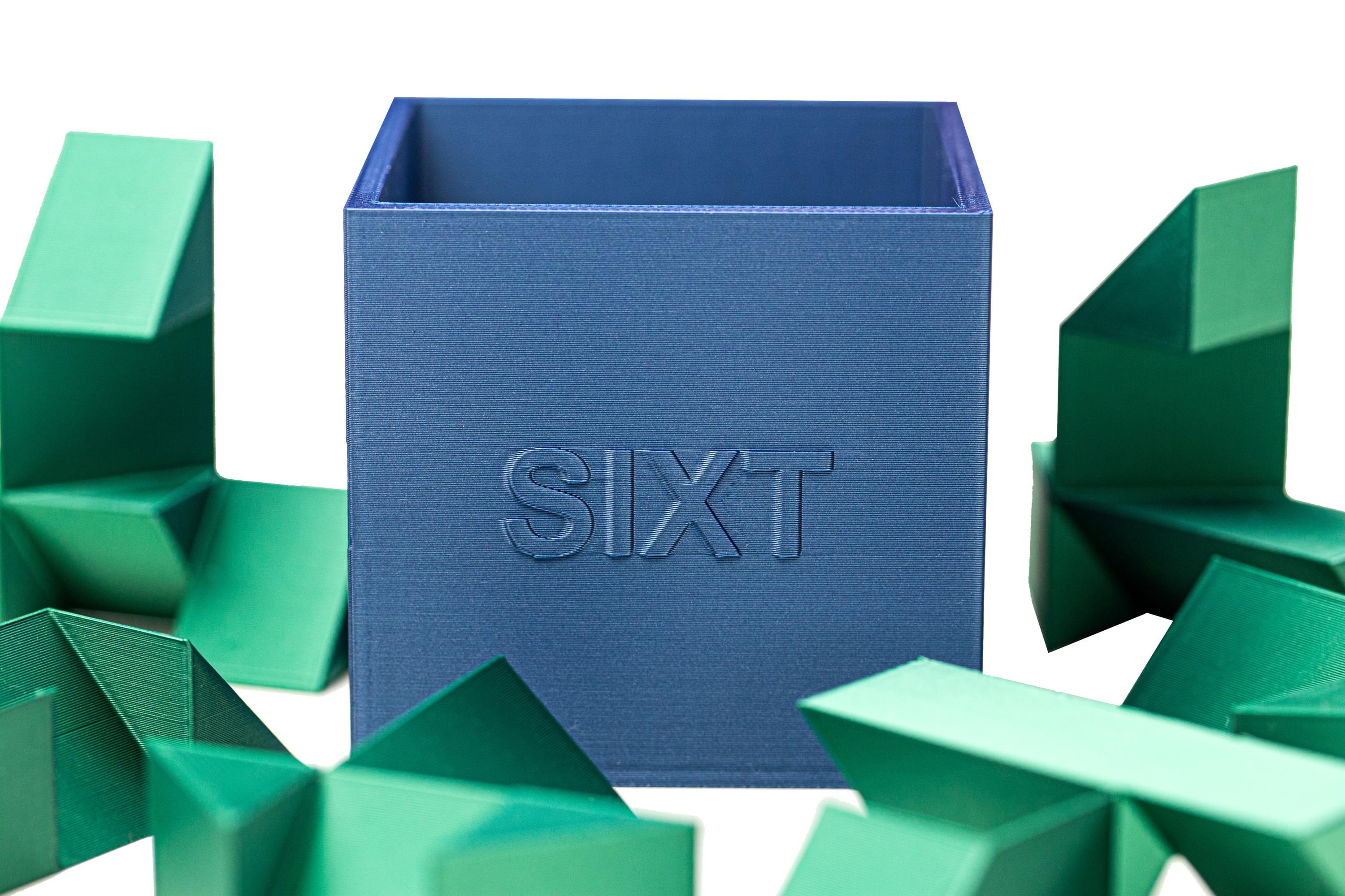 SIXT puzzle. Put all 6 parts inside the box.
