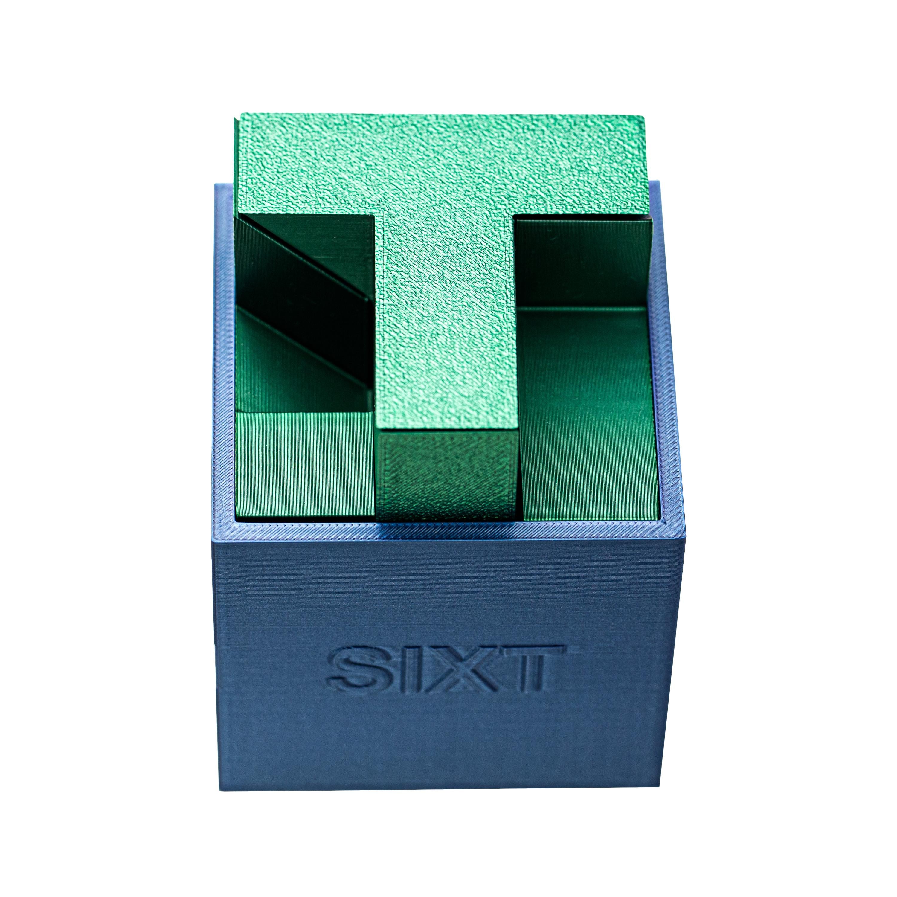 SIXT puzzle. Put all 6 parts inside the box.